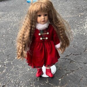 Porcelain Red Doll with Brown Hair